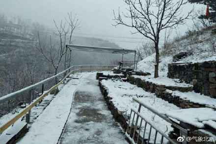  城区降雨郊区飘雪 北京今天降雨一连最高气温仅9℃