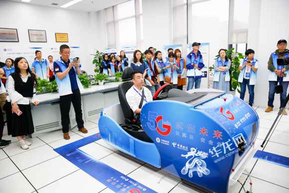 全国首个都市交通场景下的5G长途驾驶应用有多牛？网媒记者来汇报你