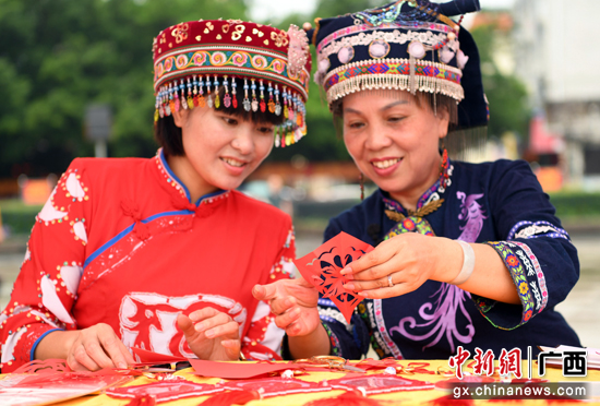 广西罗城：多彩勾当迎“文化和自然遗产日”